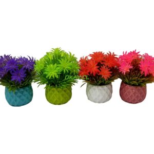Maceta cerámica redonda diseños relieve geométricos colores celeste verde blanco rosado con flores artificiales en los mismos tonos - Imagen 1